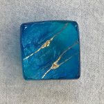 Hawai'i Lava Ring Tray by Marian Fieldson. Lava flow-molded functional glass art with 22K gold accents handmade on Hawai'i.